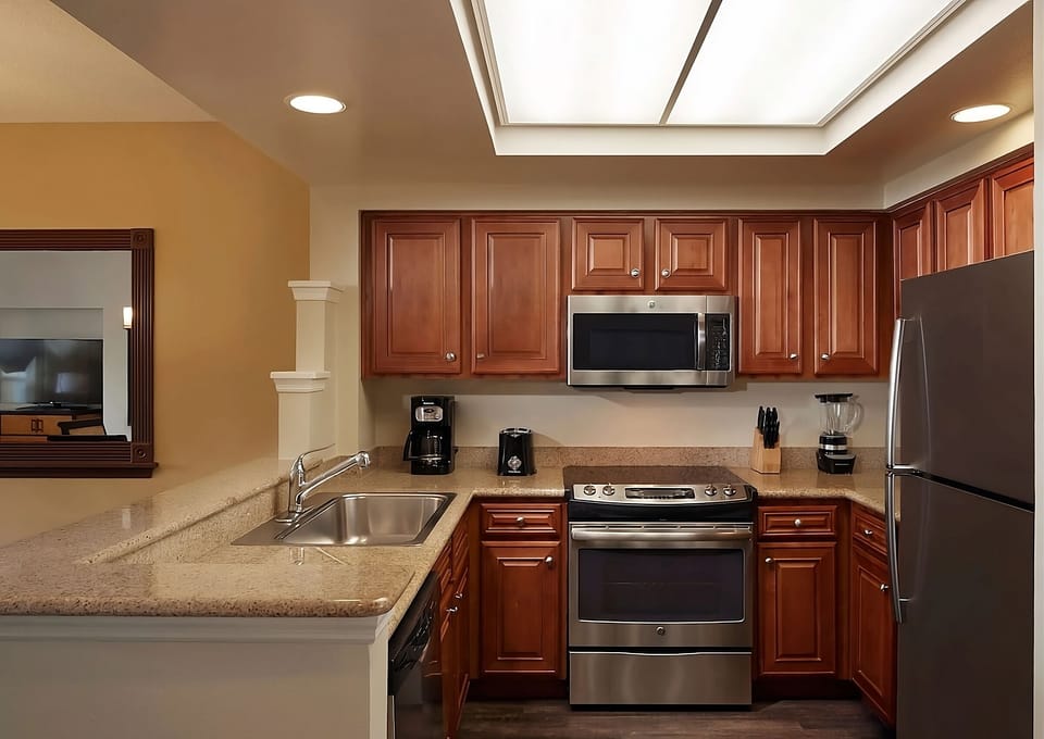 Cook with ease in a full kitchen with modern appliances.