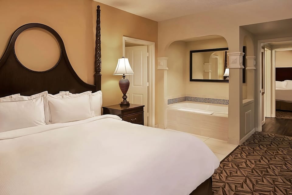 Stretch out in an airy suite with a relaxing soaking tub nearby.