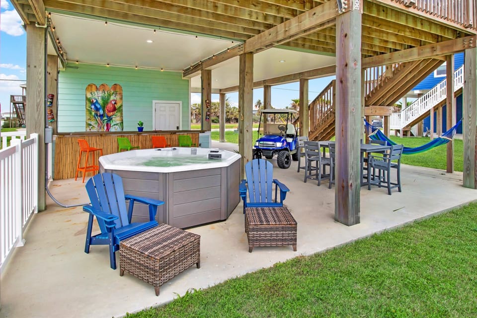 Rain or shine, the tiki bar and new hot tub for 8 is open!