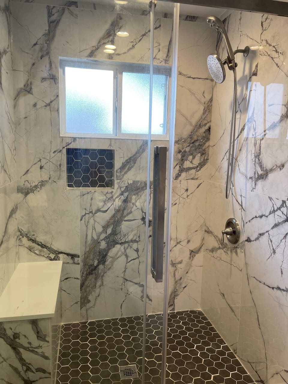Primary room en-suite walk in shower 
