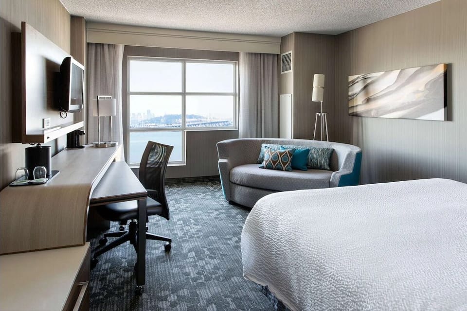 Unit with King bed. Exact unit will be assigned upon arrival. Views, colors, and decor may vary.