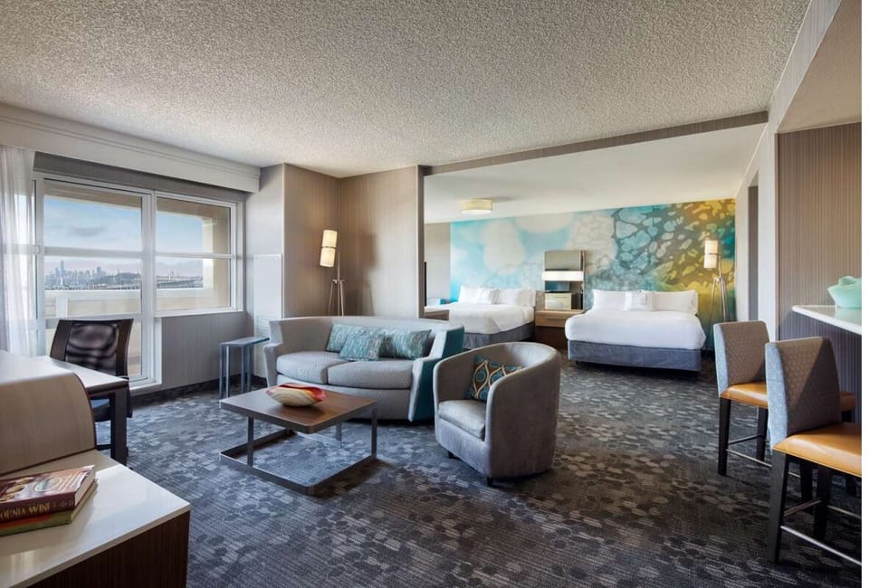 Unit with 2 Queen beds. Exact unit will be assigned upon arrival. Views, colors, and decor may vary.