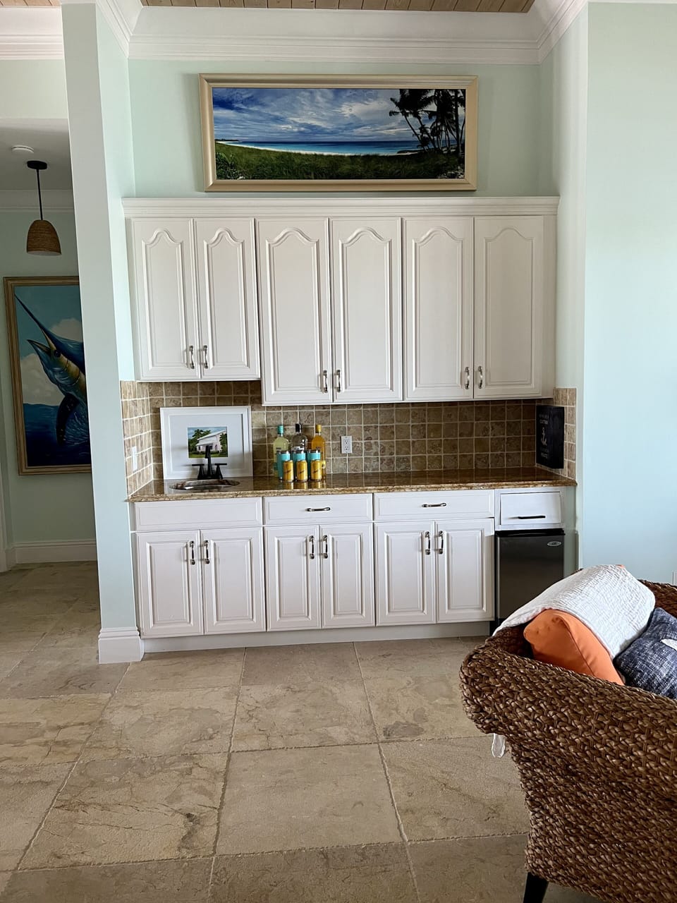 Bar area with ice maker.