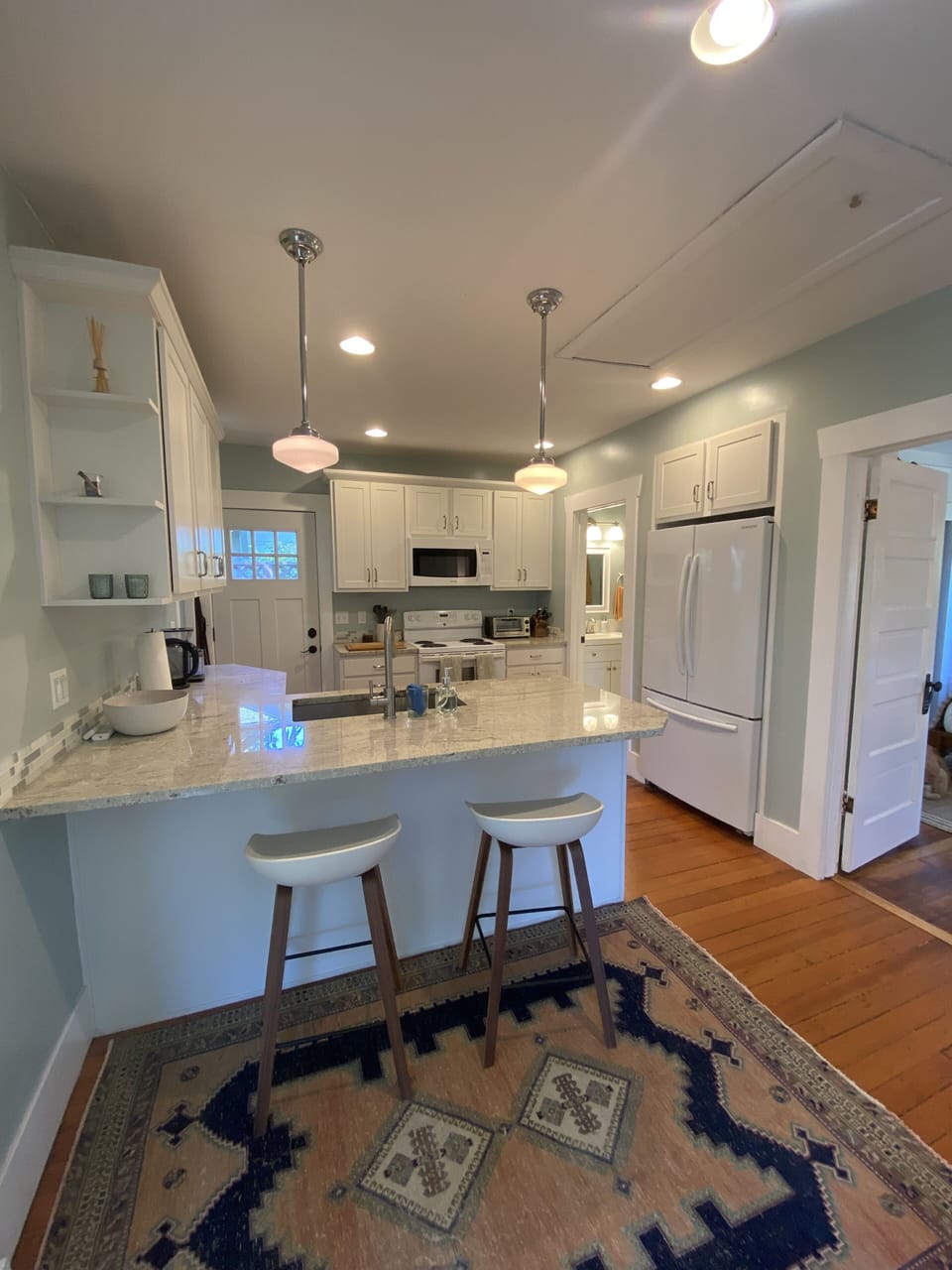 Well stocked kitchen with bistro counter