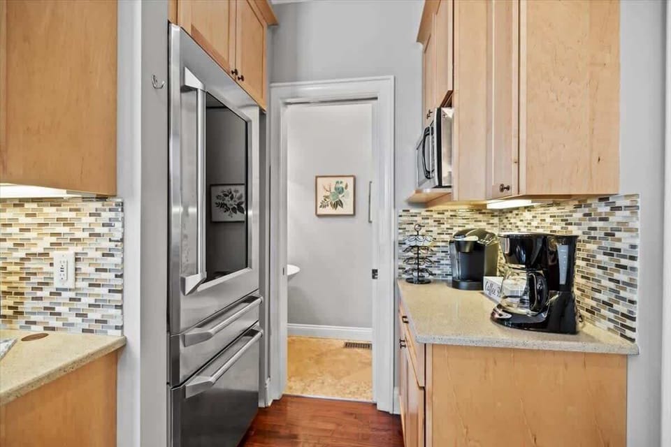 Well appointed kitchen with coffee bar that's open to the main living area.