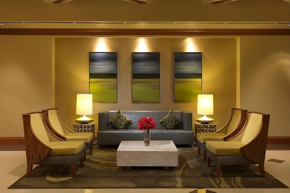 Settle into cozy seating for a calm, welcoming pause.