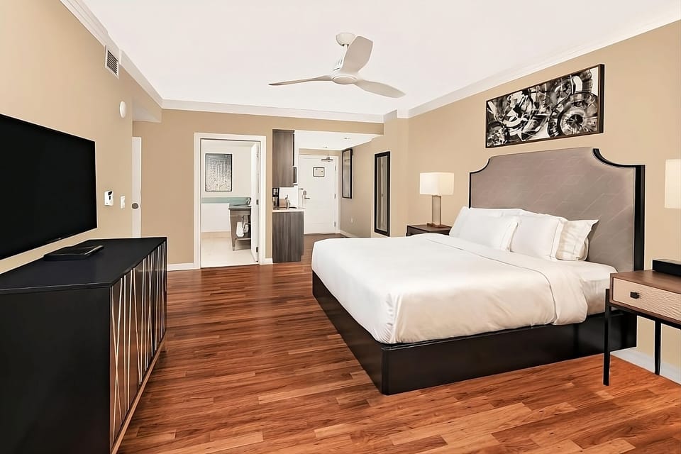 Unwind in an airy suite designed for effortless comfort.