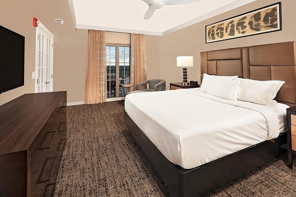 Sink into crisp linens after a day of exploring.
