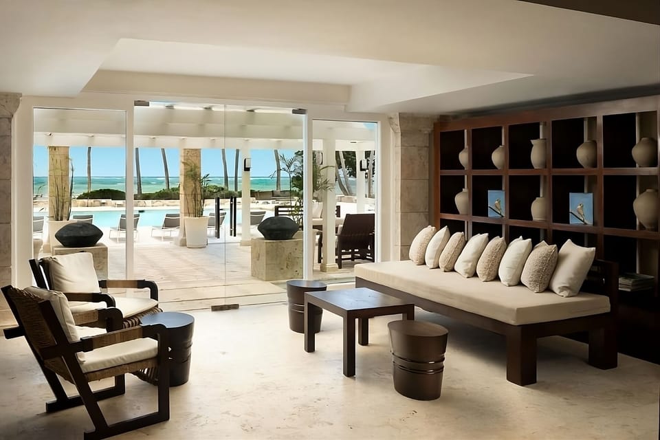 Glide over manicured grounds framed by dazzling blue water.