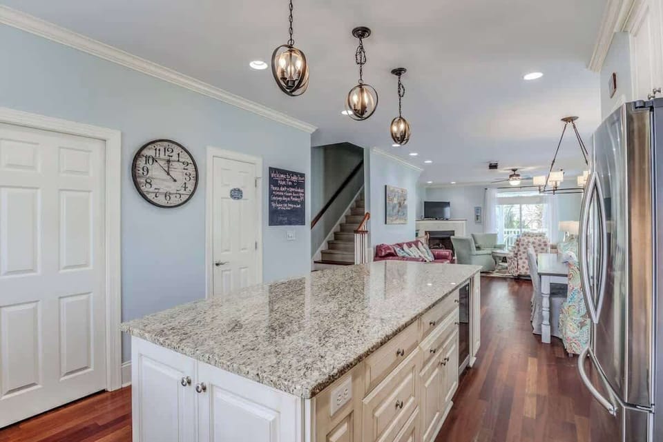 Large Kitchen Island with 4 stools and small fridge
