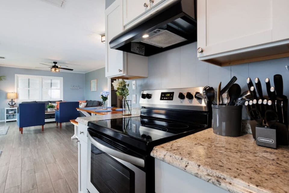 This open-concept space flows seamlessly from cooking to hanging out, so you can keep an eye on everyone while actually enjoying your time together.