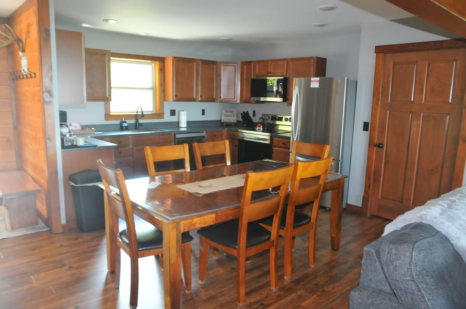 Dining room and fully stocked kitchen