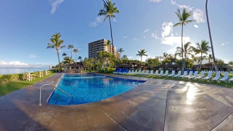 Lounge longer with expansive pool deck and ocean breezes.