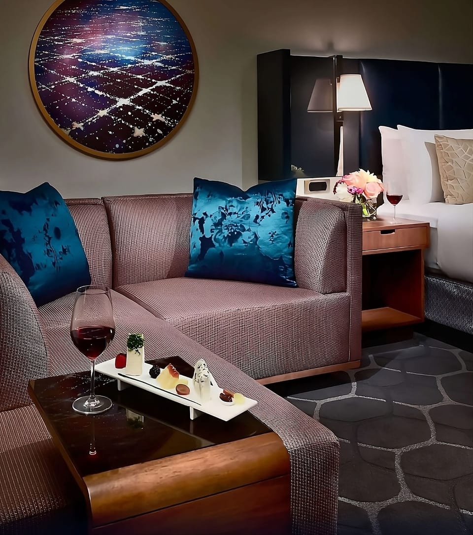 Sip wine and relax on the cozy lounge sofa.