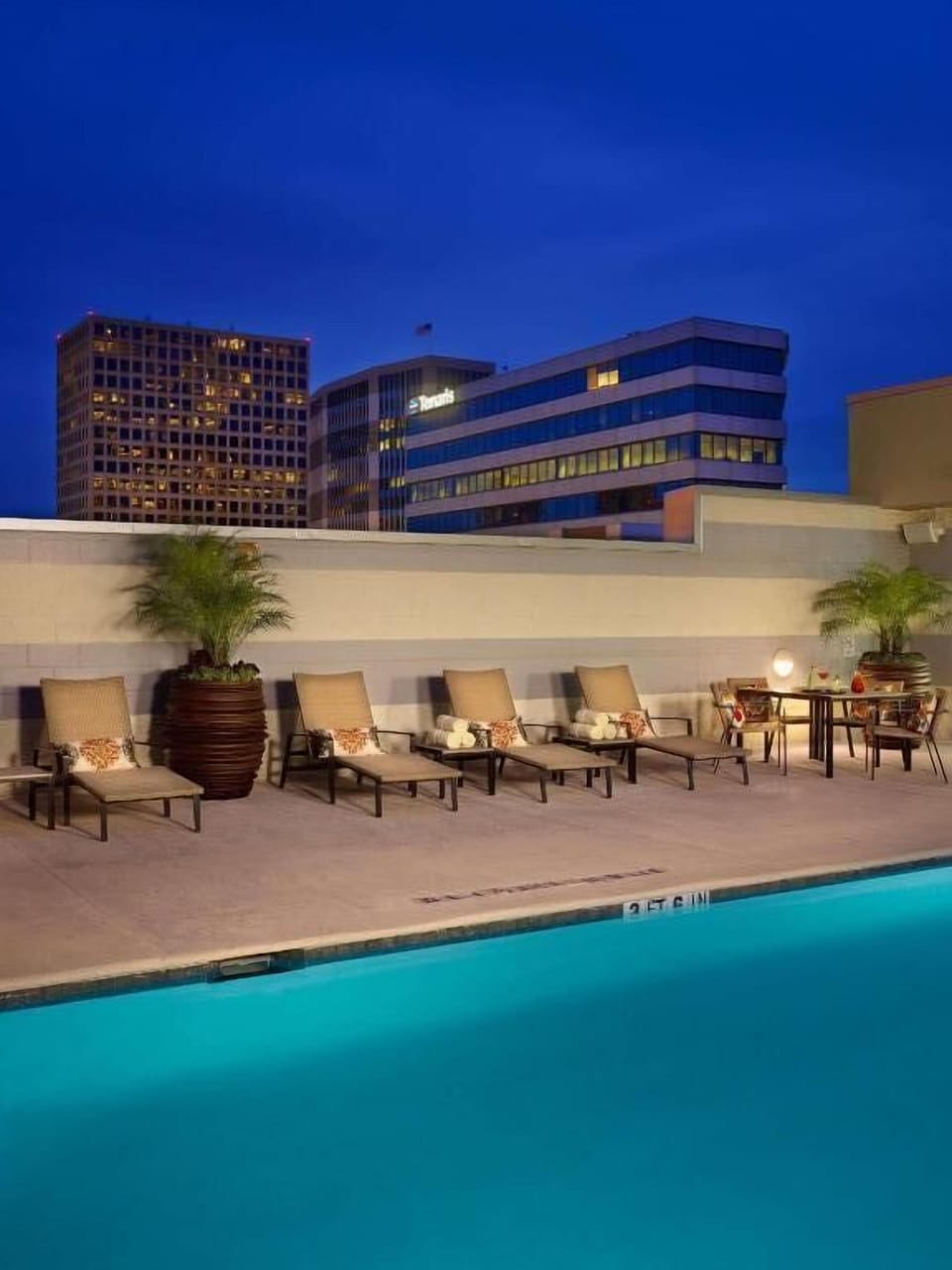 Soak up evening vibes with a refreshing rooftop-style swim.