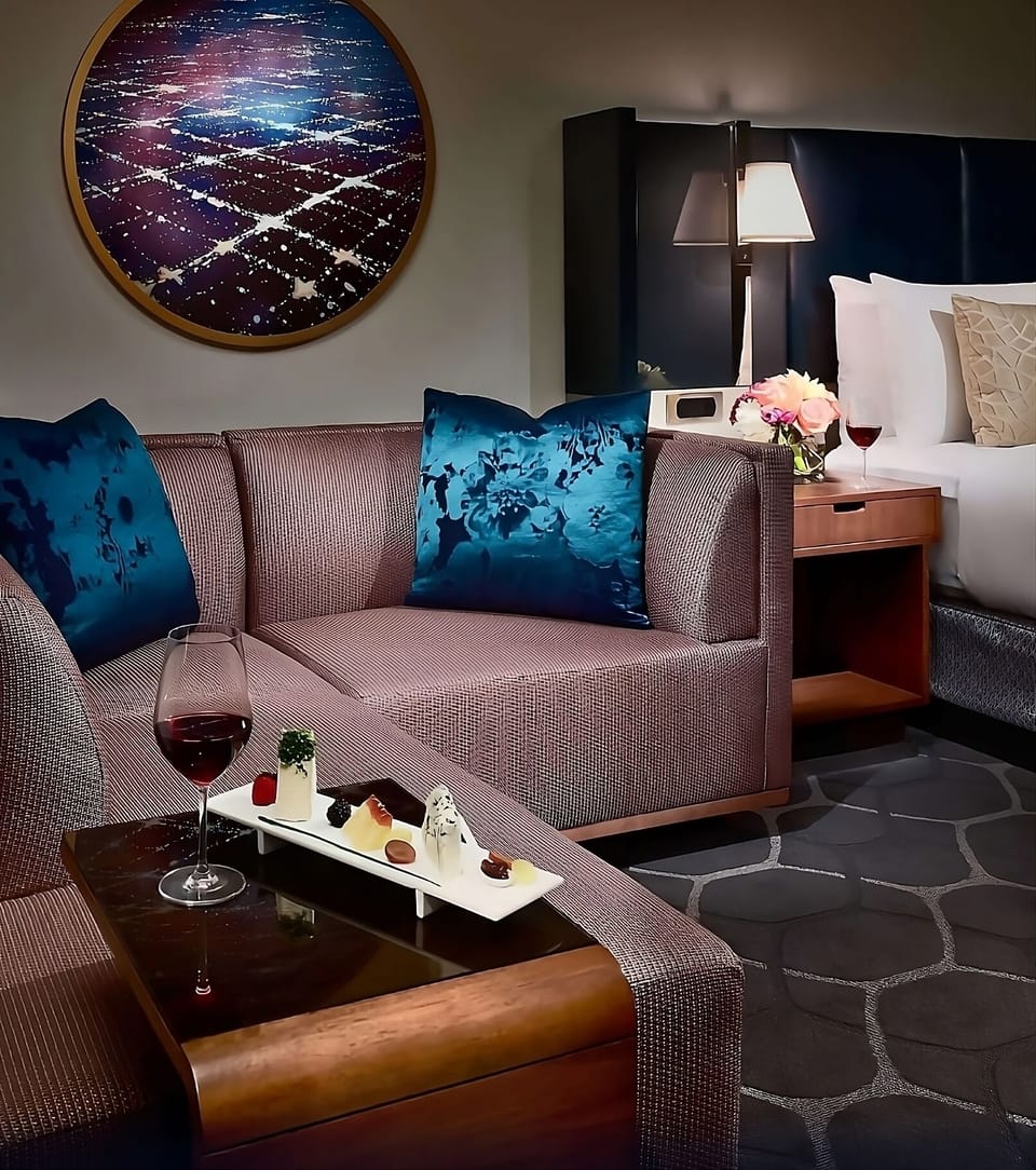 Sip wine and relax on the cozy lounge sofa.