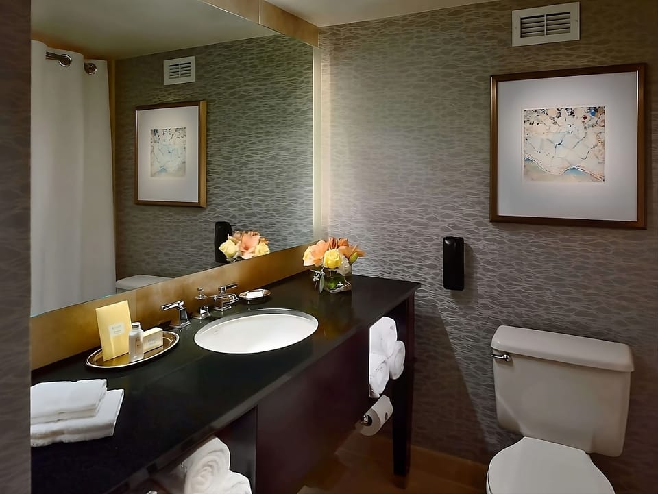 Refresh easily with a spacious vanity and soft, clean towels.