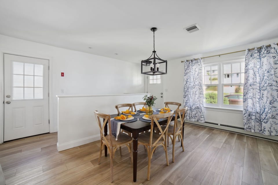 Dining table beside a sunny window