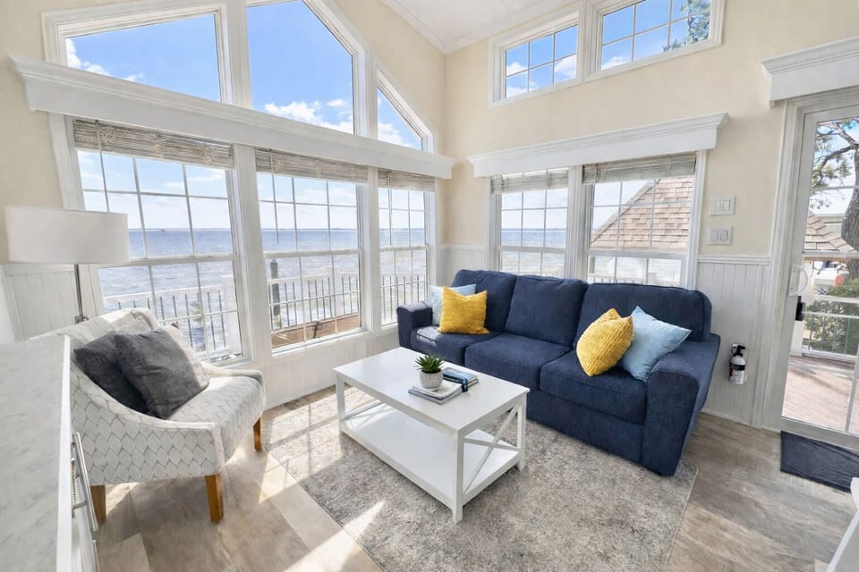 Water views from every window in the living room!