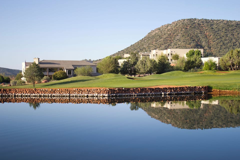 Soak in tranquil lake reflections and serene fairway views.