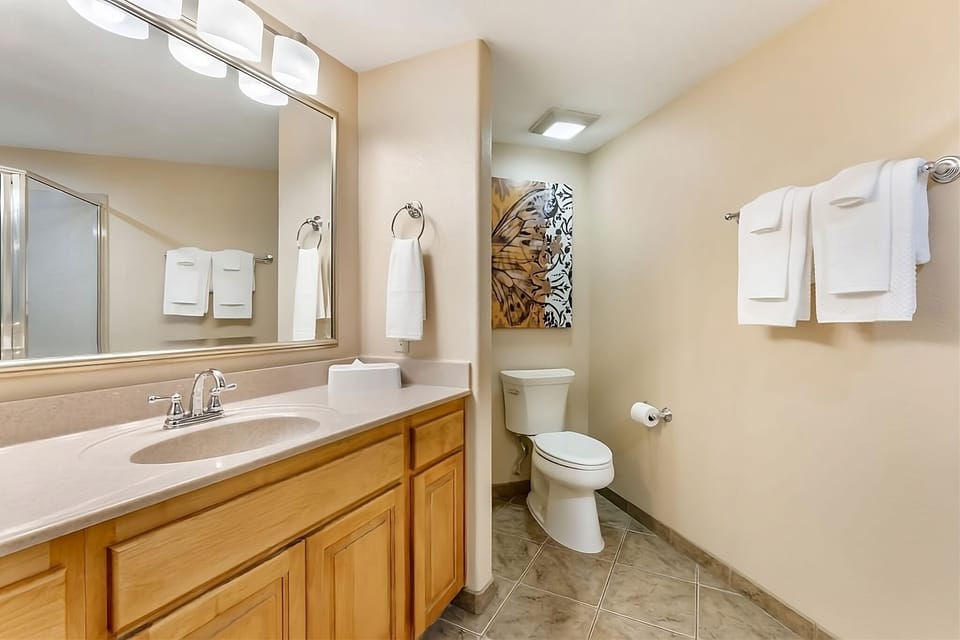 Refresh easily with a spacious vanity and clean, bright lighting.
