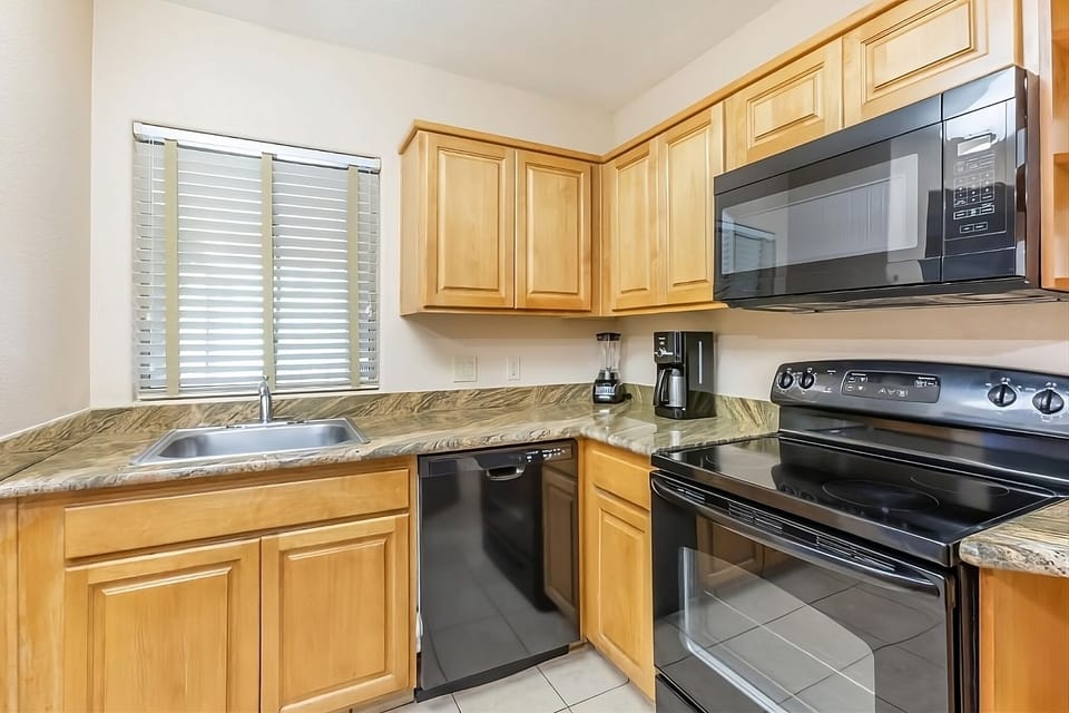 Cook and snack easily in a spotless, full kitchen.