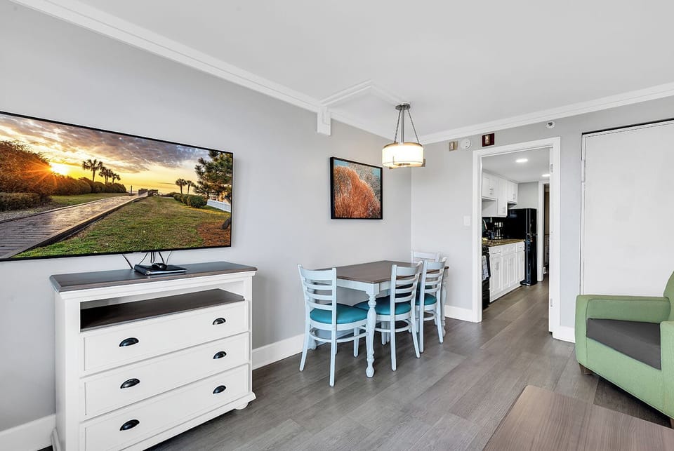 Enjoy TV while relaxing in the living room space.