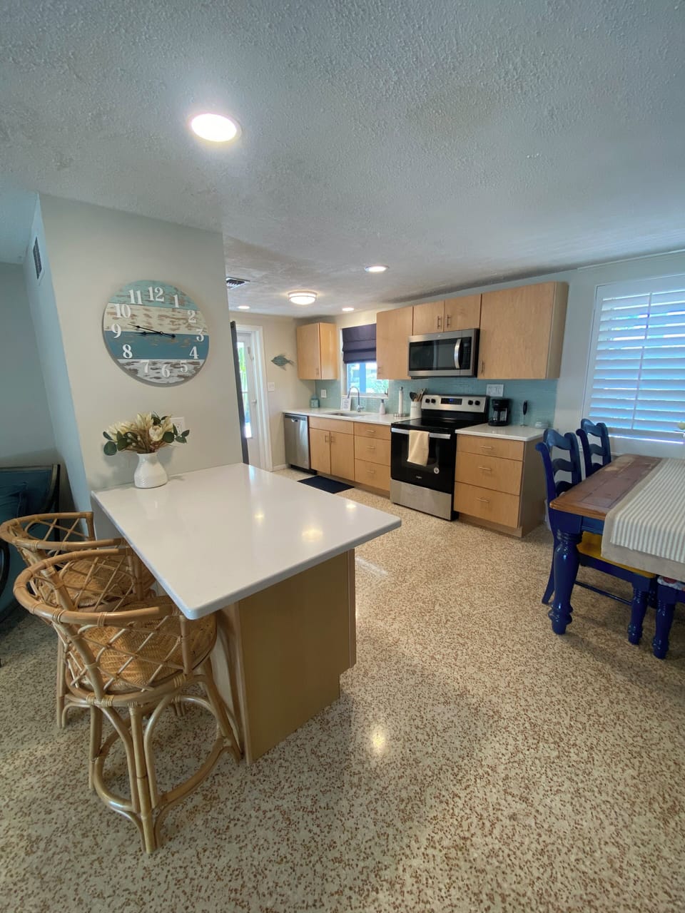 Dining table + 2 barstools for extra seating 