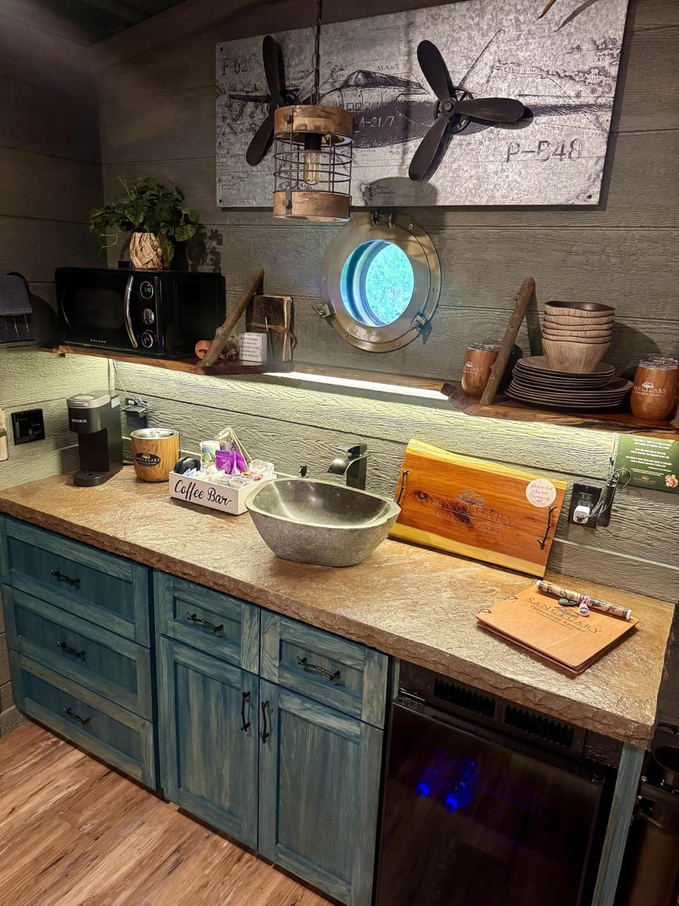 KITCHENETTE - MICROWAVE, MINI FRIDGE, DRINK CHUTE, STOCKED COFFEE CADDY, ICE BUCKET, CHARCUTERIE BOARD, FIRST AID KIT, SERVICE WARE, FLASHLIGHTS, TELESCOPE, AND MORE