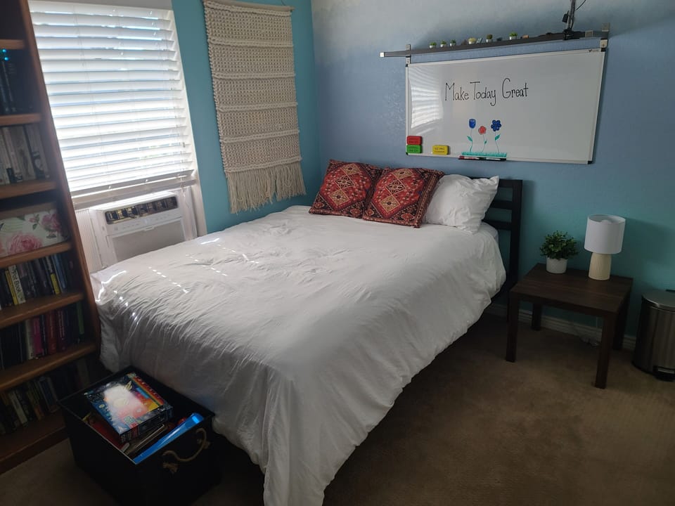 Queen bedroom with toys