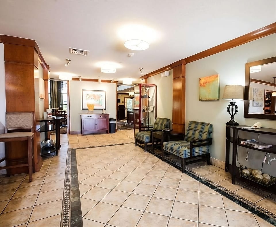 Settle in with a warm welcome in the polished lobby.