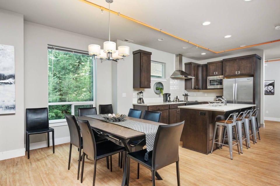 The kitchen and dining room are both spacious. This rental is a perfect place to enjoy a feast!