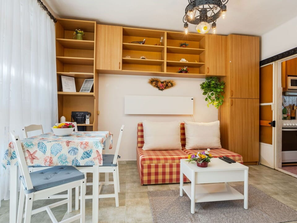 Furniture, Interior Design, Wood, Flooring, Room, Floor, Textile, Lighting, Couch, Table
