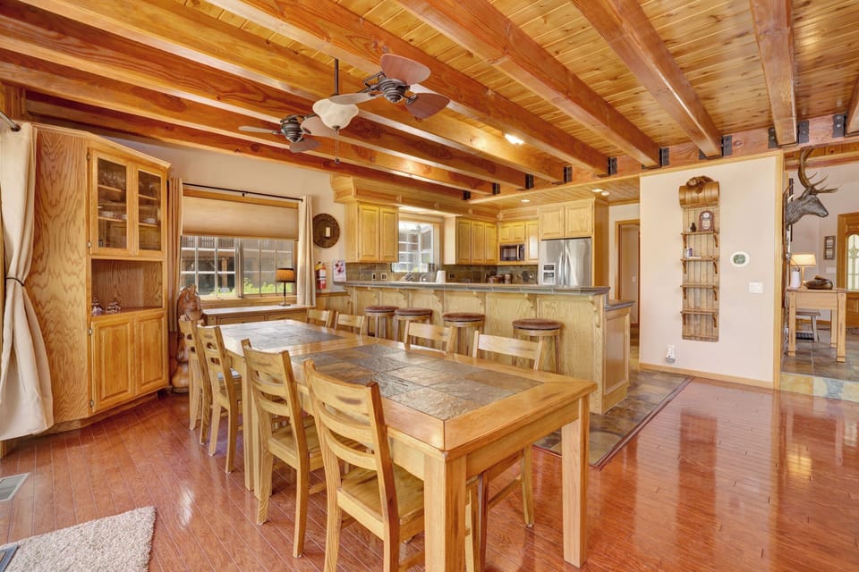 Inviting dining area designed for comfort and connection. The space feels open and airy, with a warm atmosphere that makes everyday meals and special gatherings equally enjoyable.
