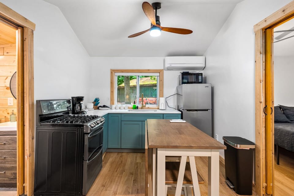 Cook up a storm in a sleek, modern space with a beautiful view of nature!
