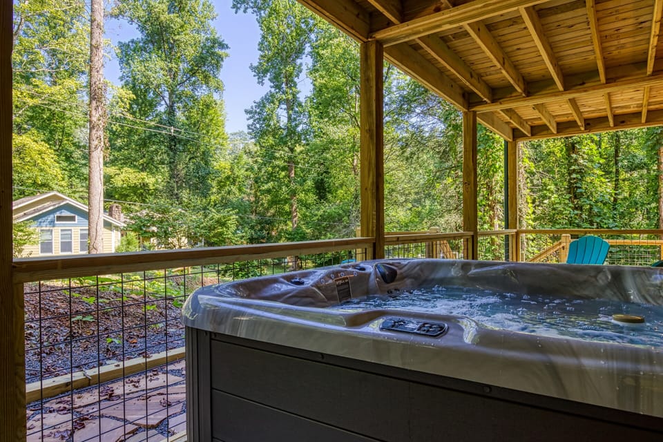 Exterior view of back porch and hot tub - Exterior view of back porch and hot tub
