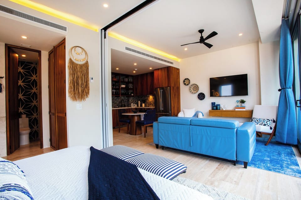 You can watch the TV from the sofa or the comfort of your bed