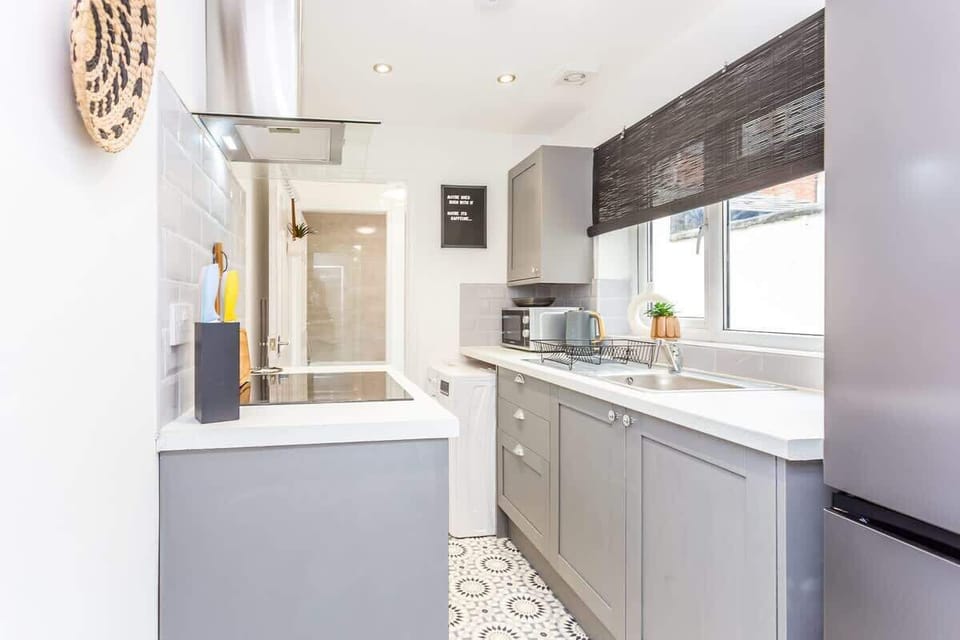 Family-friendly kitchen oasis equipped with all essentials, including a washer & dryer, oven, fridge and full cookware set. Plus, thoughtful touches like children's dinnerware ensure everyone feels right at home in this cozy culinary haven.
