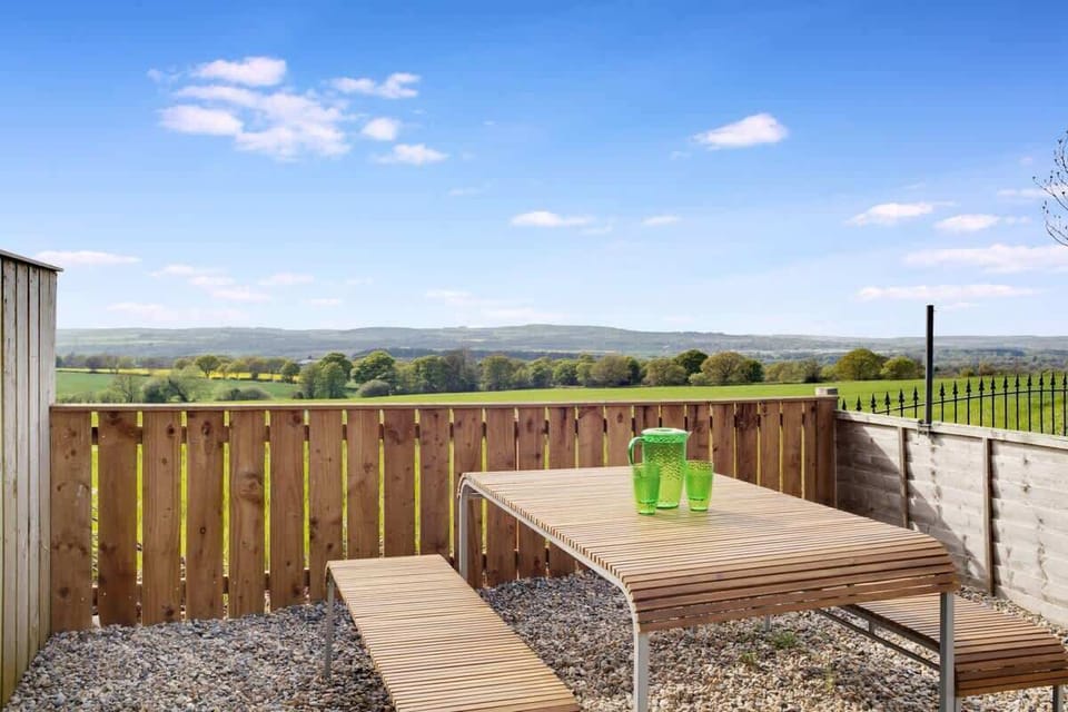 Enjoy outdoor dining with a view! Our backyard oasis boasts a scenic field vista, perfect for meals al fresco for four.