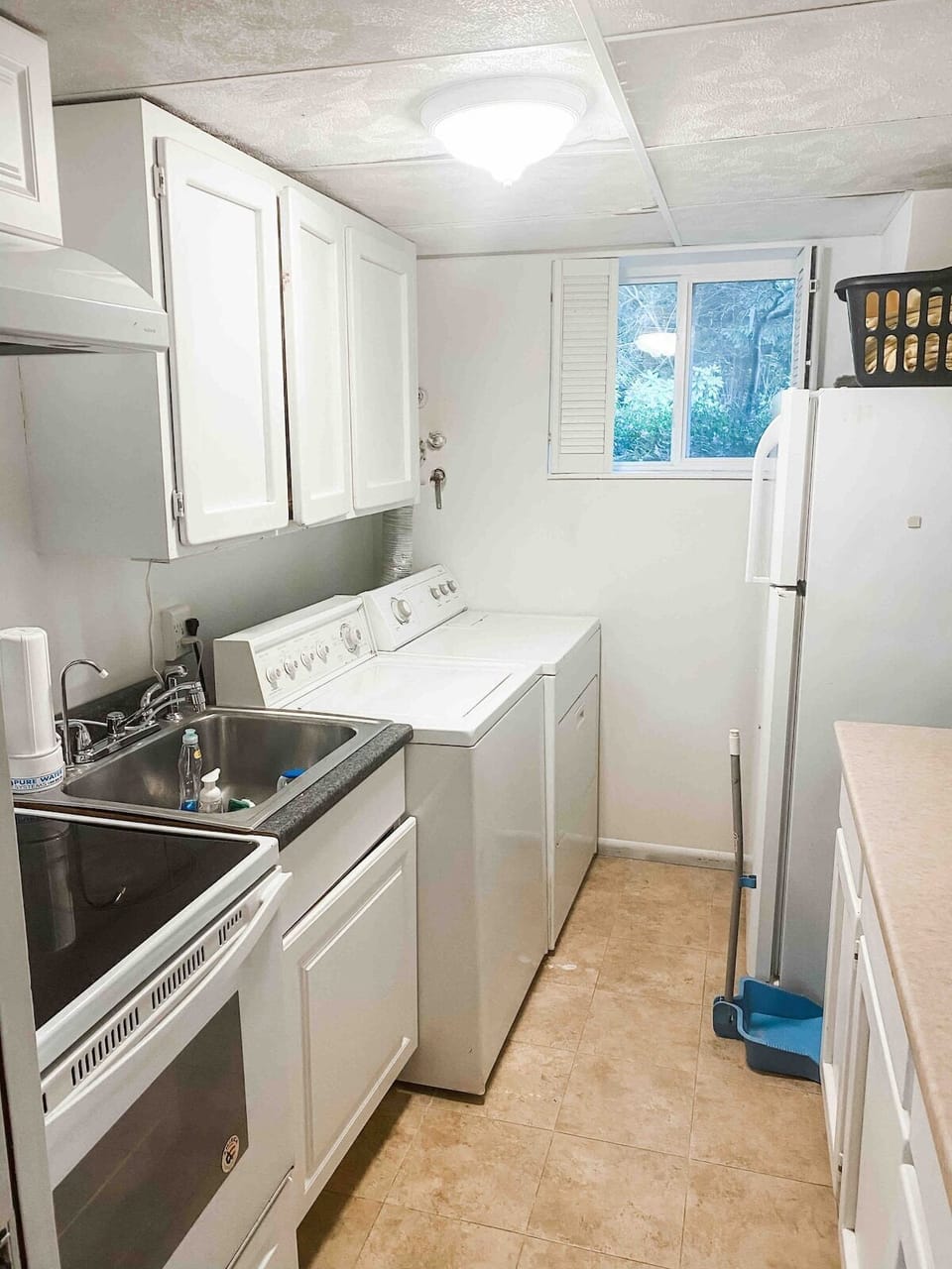 Downstairs kitchen and second laundry. 