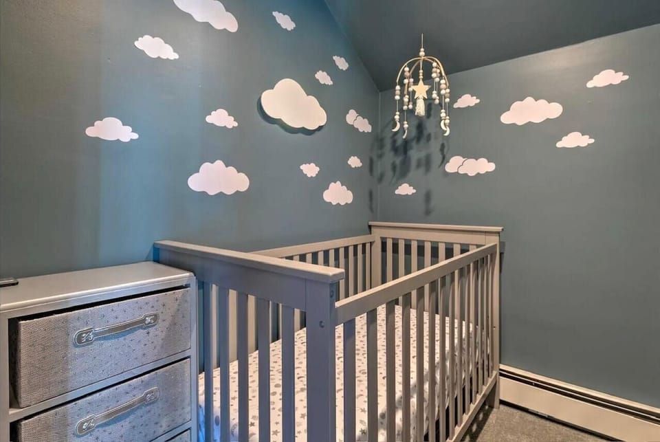 Crib located in primary bedroom upstairs