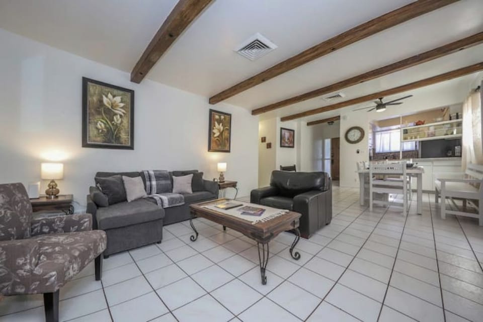 Gather in the living room and watch your favorite show or sport with a 55' TV.