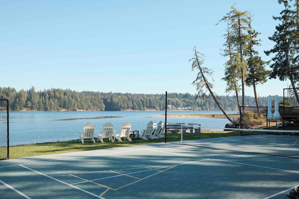 Waterfront pickleball sport court with gear for all the activities