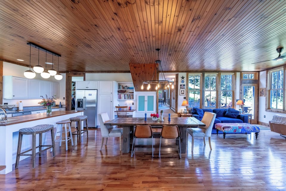 Great room includes Kitchen with dining table and fireplace and mtn views