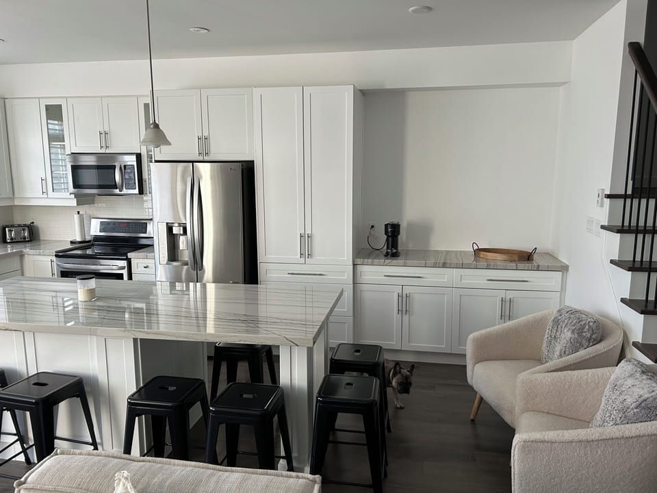 Open concept kitchen with coffee bar