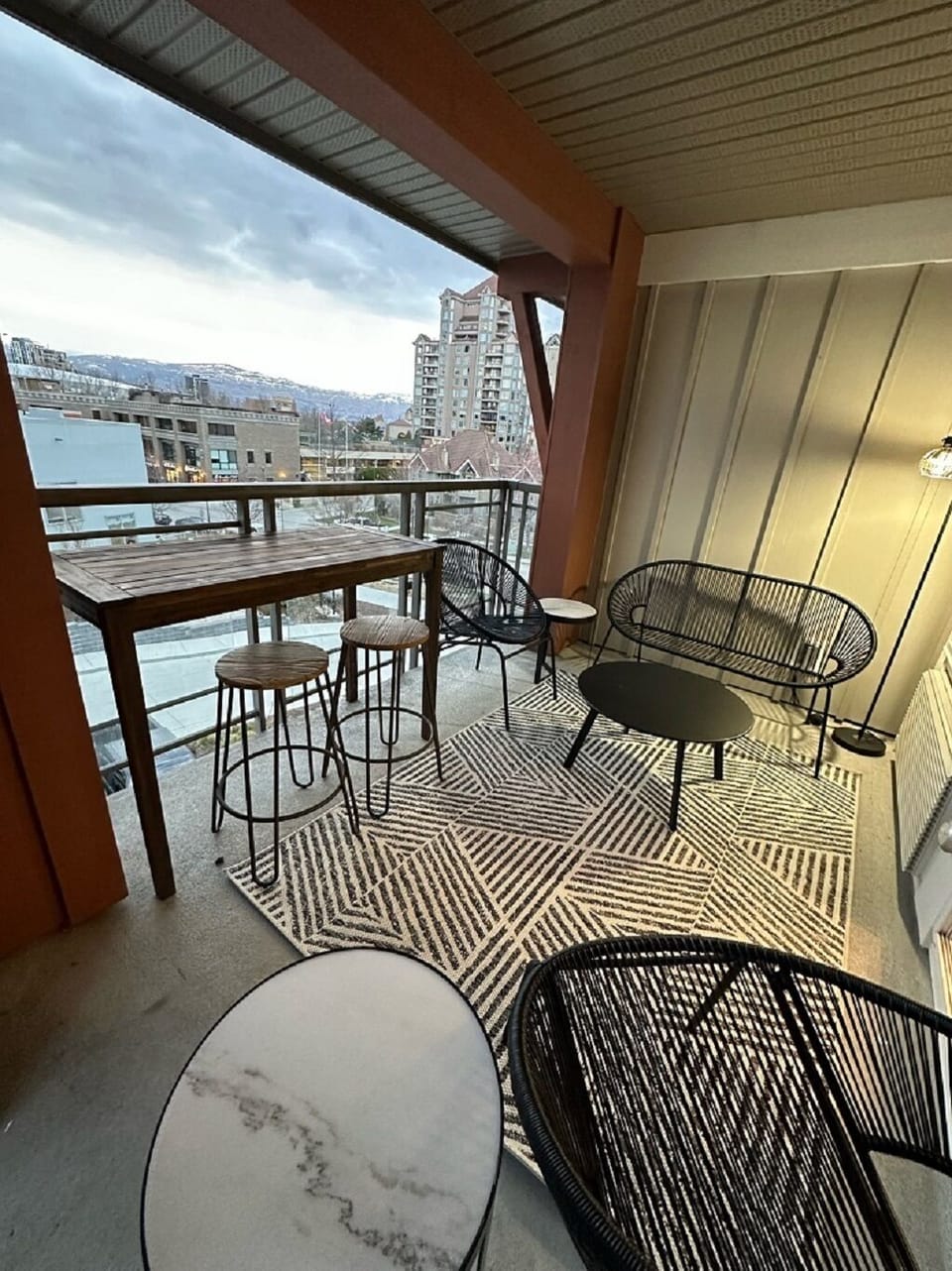 This patio is equipped with patio furniture 