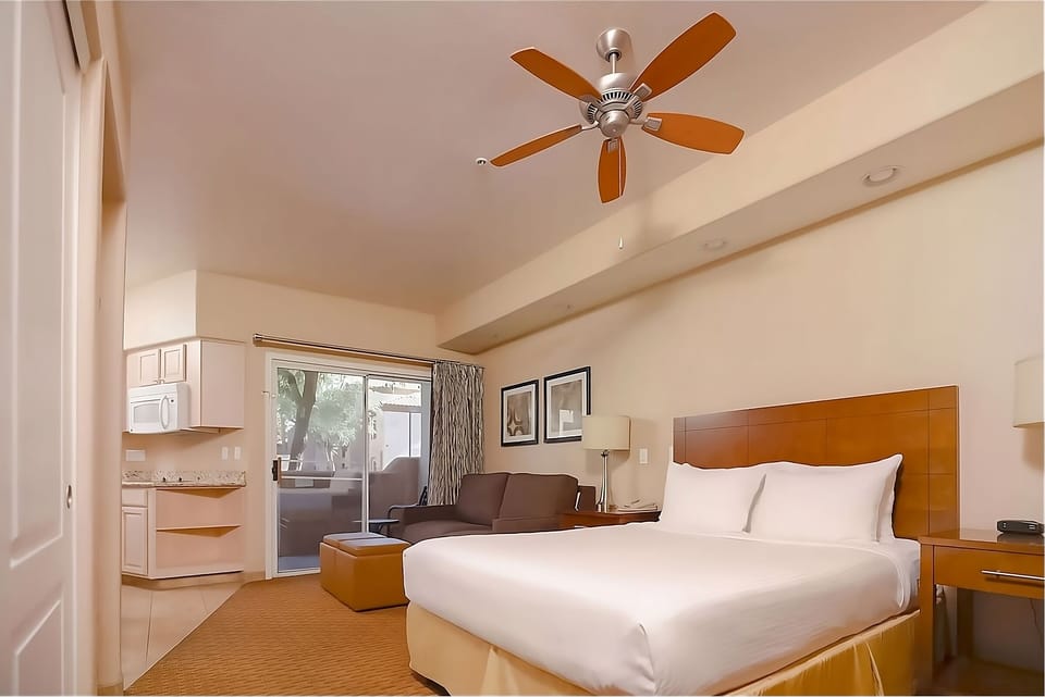 Wake up refreshed in a bright suite with kitchenette convenience.
