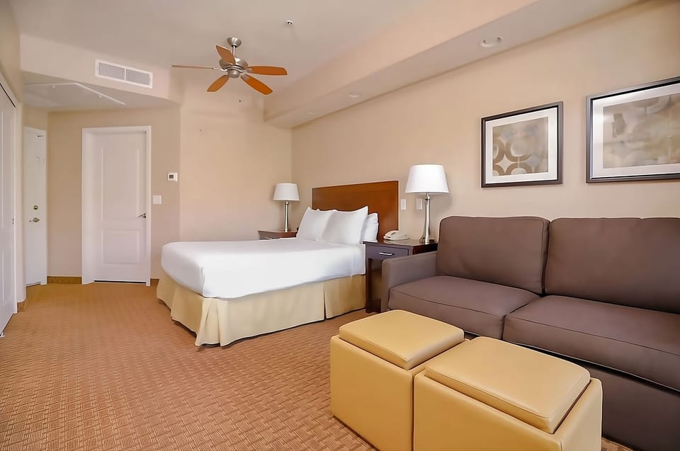 Recharge in an open, airy suite with plenty of space.