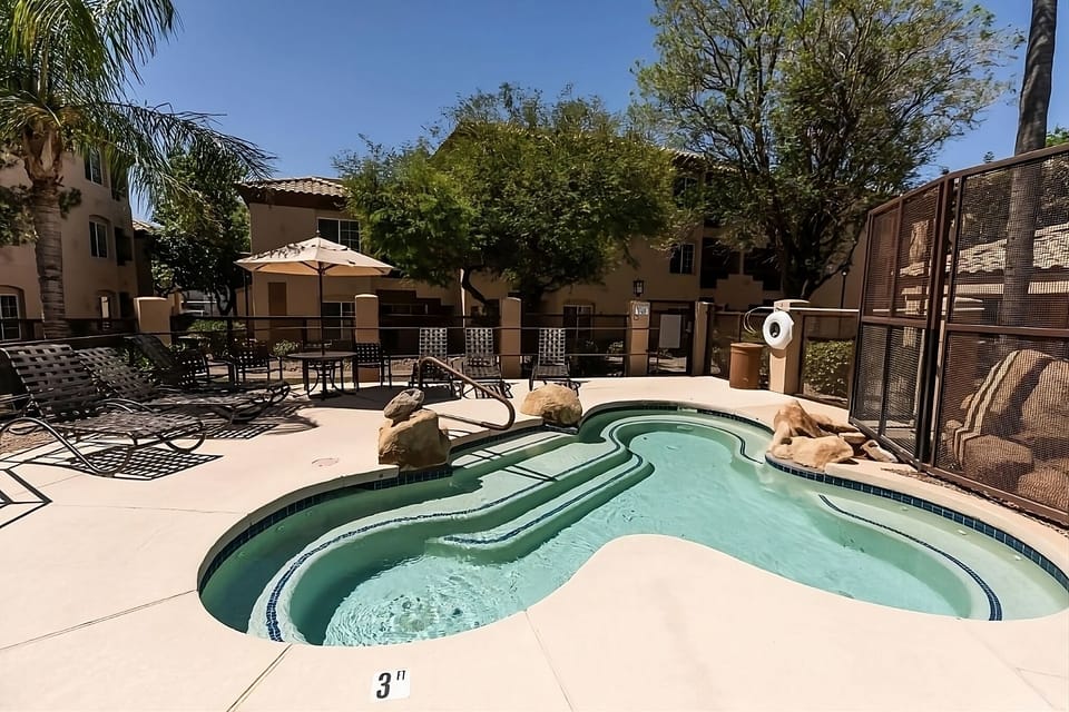 Splash and lounge beside this tranquil, tucked-away pool corner.