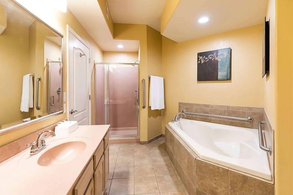 Soak and reset in a spacious bath and walk-in shower.